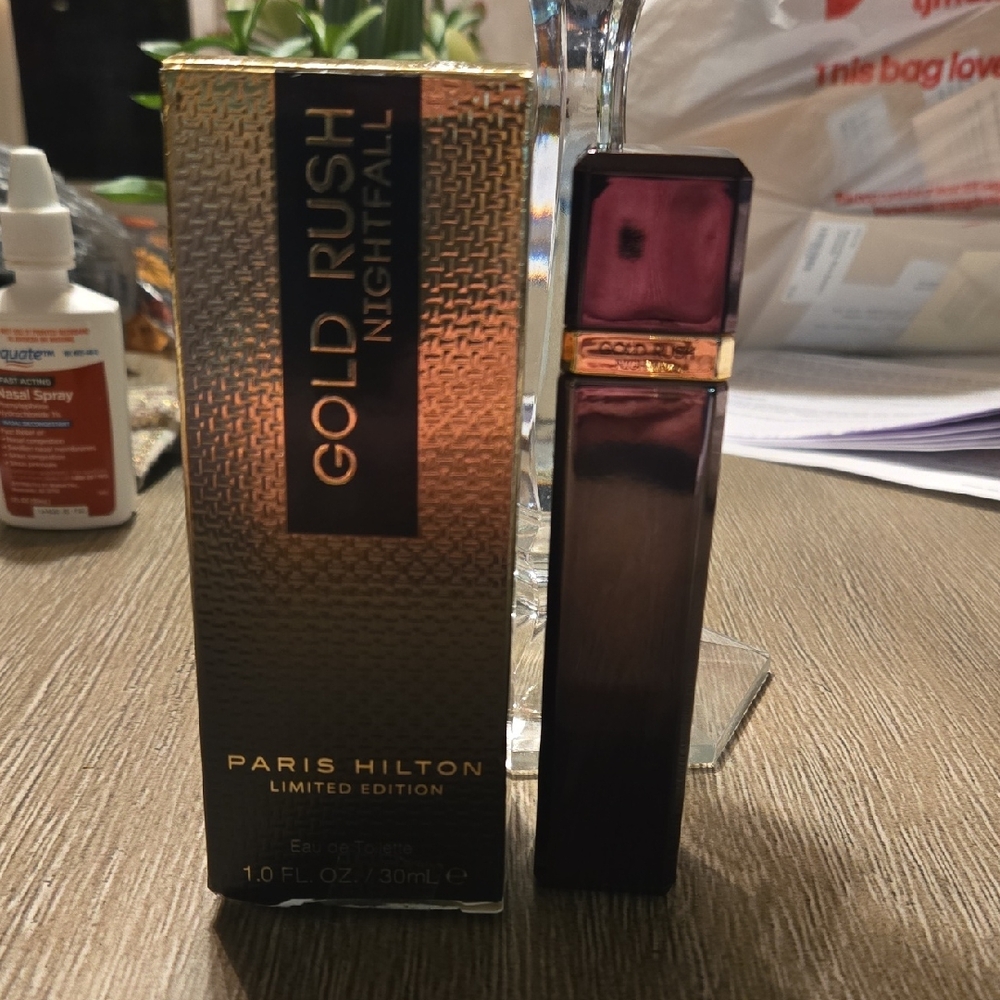 Paris Hilton Gold Rush Nightfall Perfume with Purple and Gold